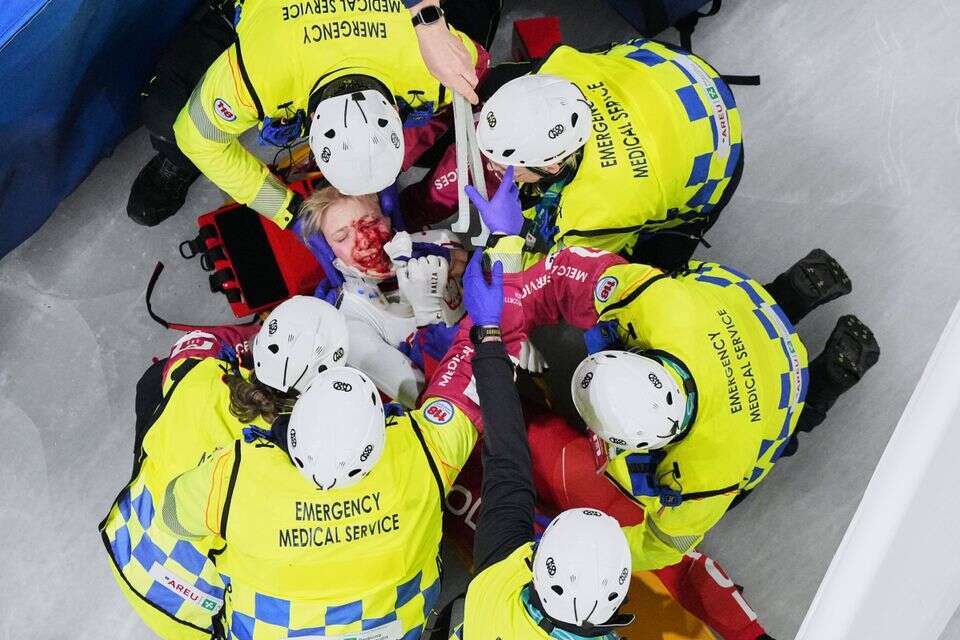 Blood on the ice: A skater was injured in the face by an opponent's blade at the Olympics