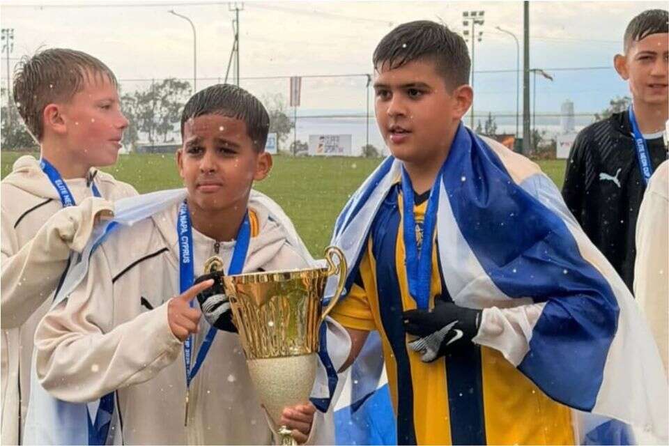 The next generation: Eran Zahavi's son celebrates a cup with Maccabi Tel Aviv