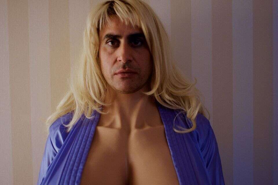 With pantyhose and heels: we have never seen Amir Shorush like this