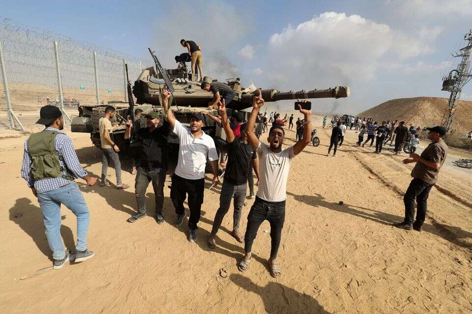 מחבלים בגבול הרצועה במהלך טבח ה-7 באוקטובר , Anadolu Agency via Reuters Conne