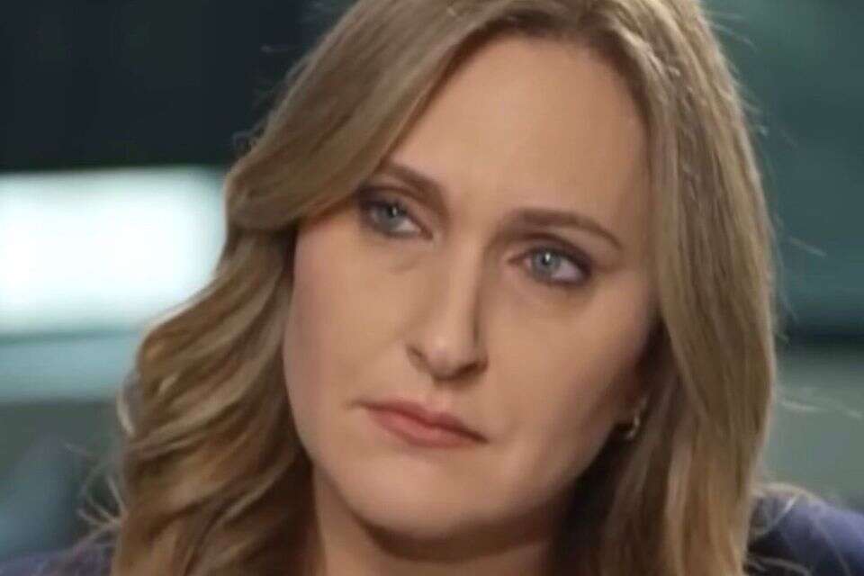 Karen Marciano entered a stranger's house and asked to protect herself