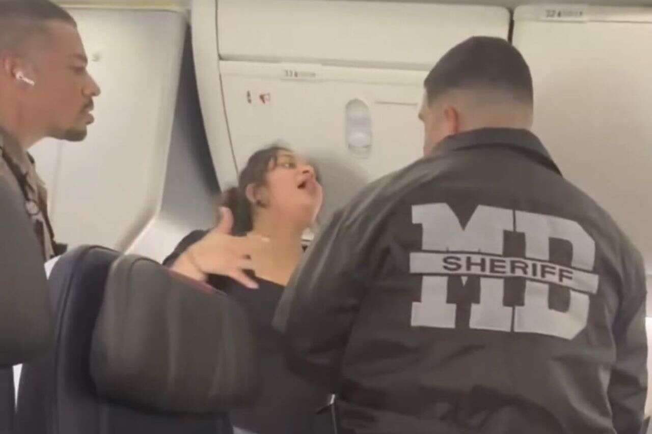 "Bullshit! I paid for it": Passenger taken off flight to applause