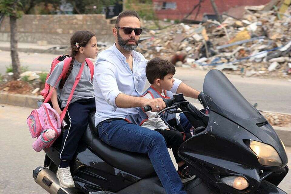 תושבי הפרברים הדרומיים של ביירות שבים הביתה , רויטרס