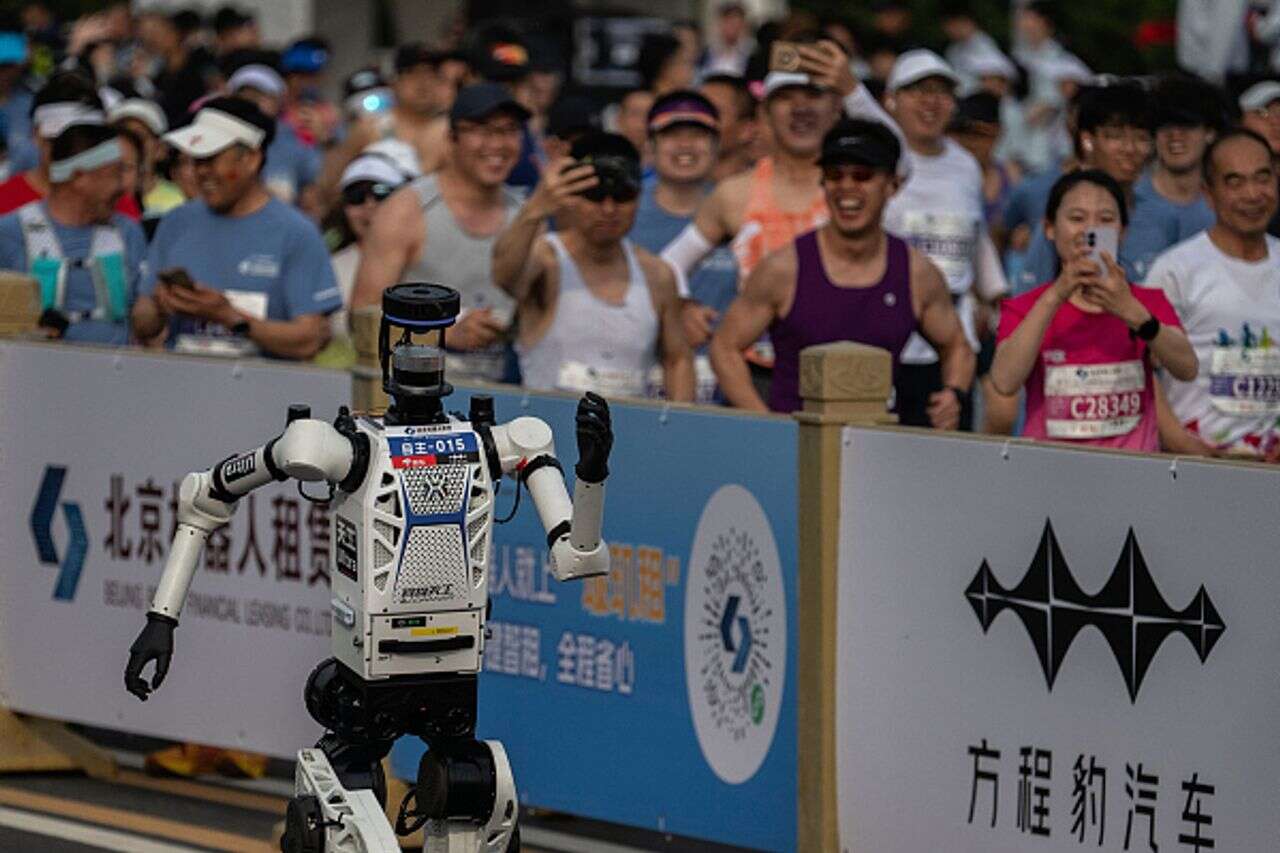 History in China: Robots beat humans in a half marathon watch