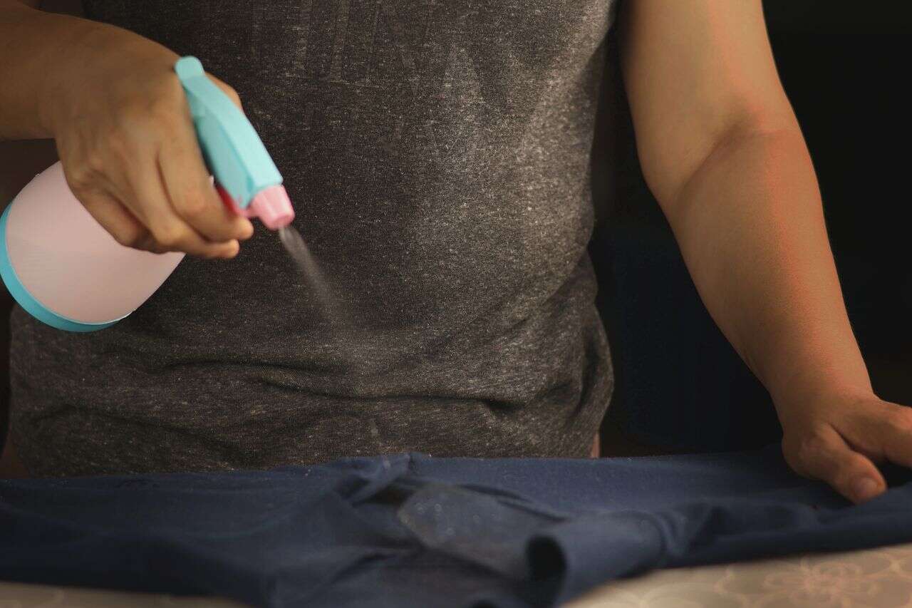 Conquering the web: Why does everyone spray hairspray on the shirt collar?