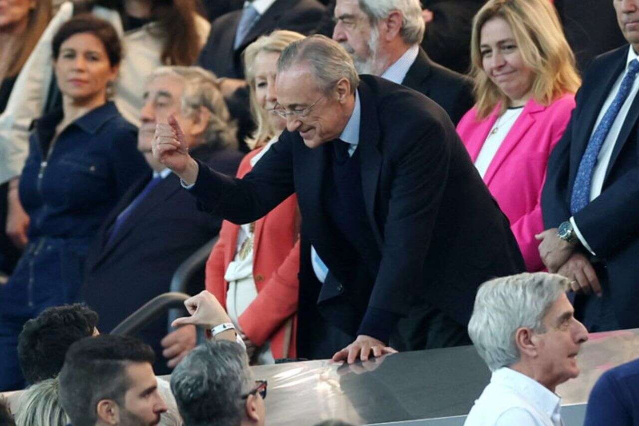 Real Madrid fans waved signs against Florentino Perez - who started fighting with them