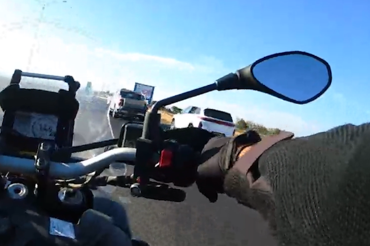 With a weapon drawn: Watch the chase and arrest of a car thief on Route 6