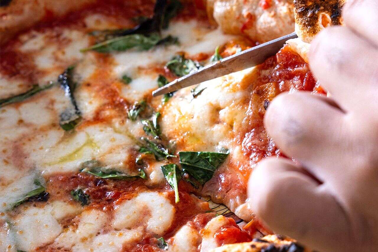 We thought the tiramisu was excellent, then we found out: the pizza here has superpowers