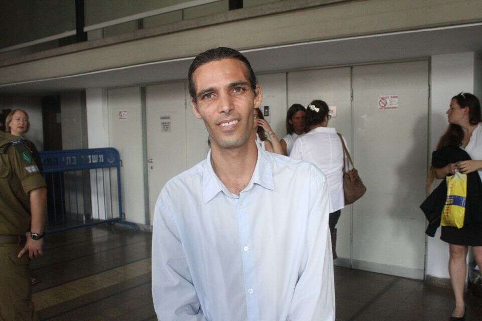יגאל רצון, בנו של גואל רצון בעת הדיונים בהכרעת הדין של אביו ב-2014 , רוני שיצר