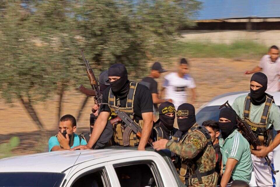 מחבלי נוח'בה פורצים לישראל ב-7 באוקטובר , AFP