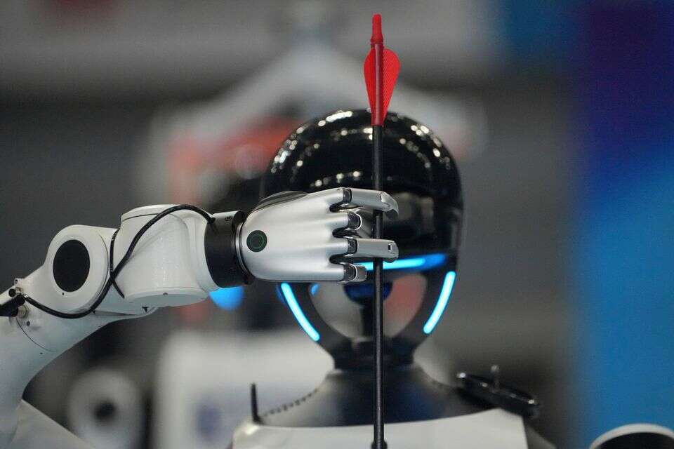 A humanoid robot competes in the pitch pot legged group final during the World Humanoid Robot Games in Beijing, Wednesday, Aug. 26, 2026. (AP Photo/Achmad Ibrahim) , אי.פי