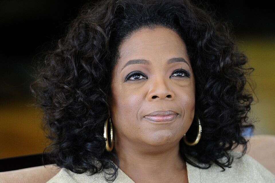 (FILES) US talk show queen Oprah Winfrey looks on as she answers journalist's questions at her South African girls' academy on January 13, 2012 in Henley on Klip. US talk show icon Oprah Winfrey says racism was behind a Swiss luxury boutique's alleged refusal to let her buy a handbag, but the store denied any wrongdoing on August 9, 2013. "I'm in a store, a name-brand store. I'm by myself, absolutely nobody else with me. And I say to the woman, 'I would like to see that bag on the shelf'," Winfrey told King. "And she says, 'No, that one's too expensive. I'll show you this one'," said Winfrey.
AFP PHOTO/ STEPHANE DE SAKUTIN *** Local Caption *** 11.08.13
19.06.20 ? , AFP PHOTO/ STEPHANE DE SAKUTIN