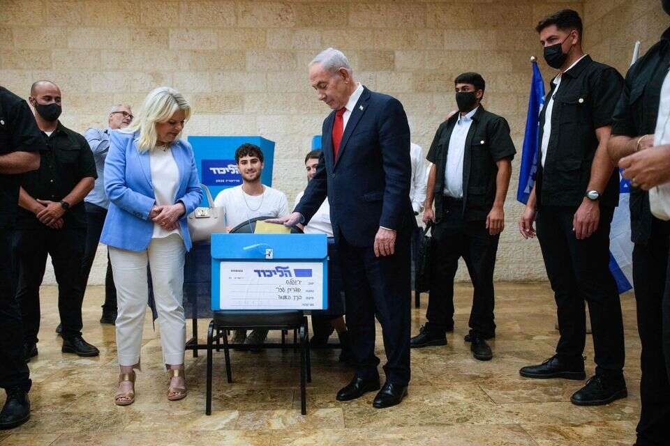 ביבי ושרה מצביעים בבחירות , AFP