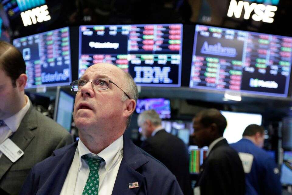 Trader Frederick Reimer works on the floor of the New York Stock Exchange, Tuesday, Feb. 6, 2018. The Dow Jones industrial average fell as much as 500 points in early trading, bringing the index down 10 percent from the record high it reached on Jan. 26. The DJIA quickly recovered much of that loss. (AP Photo/Richard Drew) *** Local Caption *** 07.02.18 , AP Photo/Richard Drew