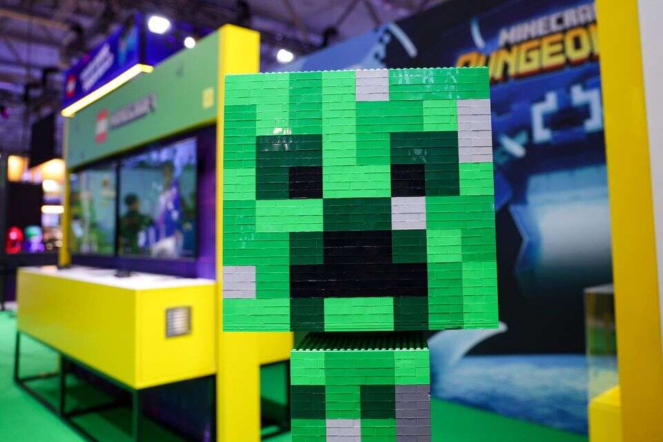 epa13192692 A Minecraft creeper built with Lego, the Danish construction toy manufacturer and global entertainment company, is on display at the Gamescom gaming convention in Cologne, Germany, 26 August 2026. The 2026 Gamescom is again the world's largest games fair, gathering the most important international players, and will run until 30 August.  EPA/CHRISTOPHER NEUNDORF , EPA/CHRISTOPHER NEUNDORF