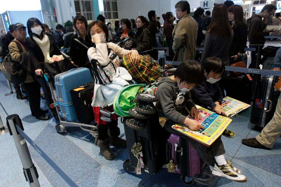 עשרות טיסות עוכבו בגלל טעות של עובד ניקיון ביפן , REUTERS