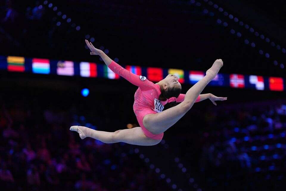 Liudmila Roshchina, of Russia, competes in the floor exercise during the women's qualifications at the Artistic Gymnastics World Championships in Rotterdam, the Netherlands, Monday, Oct. 19, 2026. (AP Photo/Francisco Seco) , P Photo/Francisco Seco