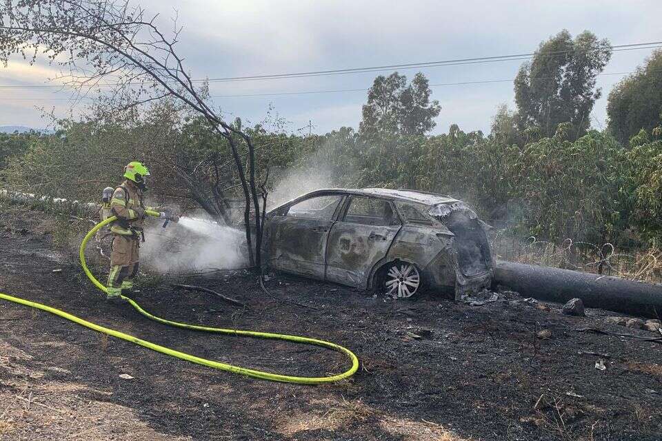 זירת הרכב השרוף בכביש 92 ברמת הגולן , כבאות והצלה לישראל