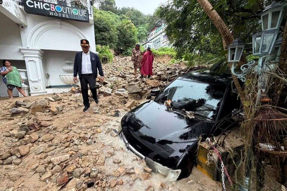 נזקים כבדים ברחבי אי הנופש האהוב , Phuket province's Public Relations Department via AP